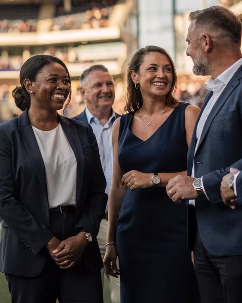Business guests enjoying pitchside access before a rugby match